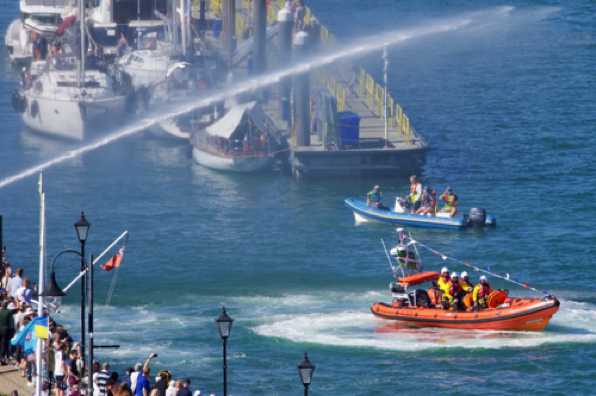 09 July 2022 - 16-59-44
The Fire Brigade provided a very wet arch and just about every active boat used its horn. Mind you, in the centre of the river was a superyacht A2. Now its horn could be heard in Halifax. In Canada.
---------------------
Dart RNLI new Lifeboat arrives